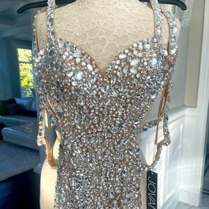 New with tags, fits 34-26-36 .